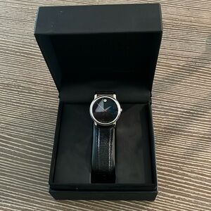 Women’s black Movado watch